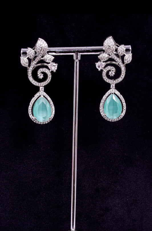 Small earrings with turquoise blue and white zircon stones