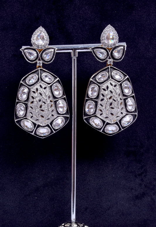 Earrings adorned with  polki semi-precious stones and white zircon